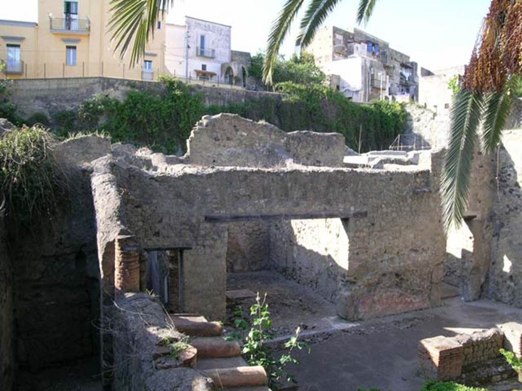 III.11 Herculaneum. May 2005. Looking towards rooms 15,16 and 17, on west side of peristyle garden, taken from III.13.
Photo courtesy of Nicolas Monteix.
