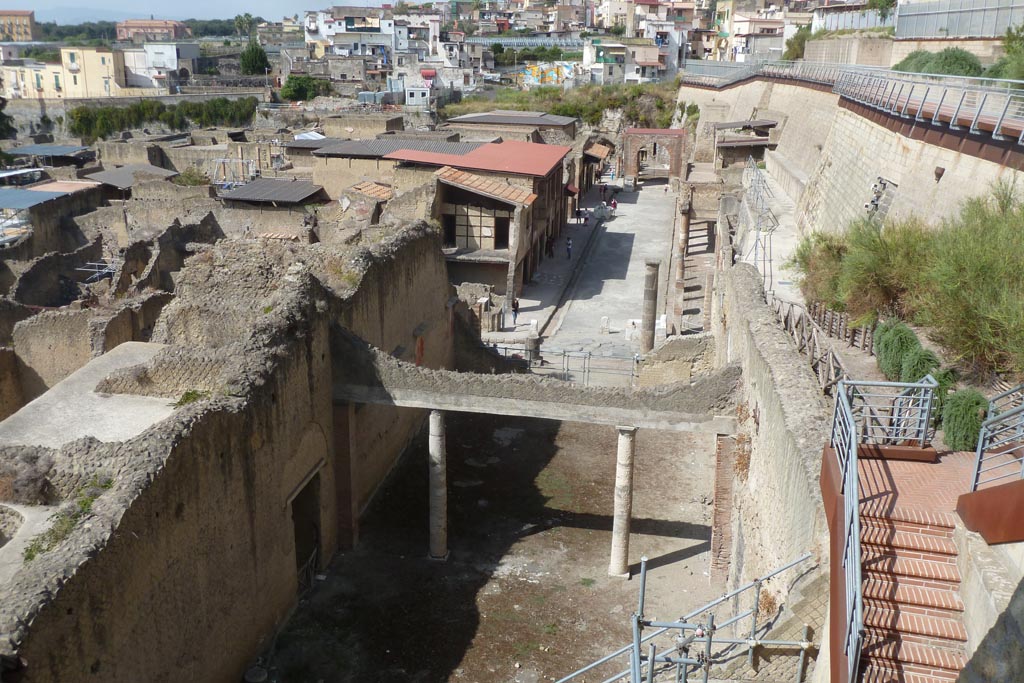 Herculaneum, September 2014. 
Looking west across site at northern end, towards Decumanus Maximus. from access roadway bridge. Photo courtesy of Larry Turner.
