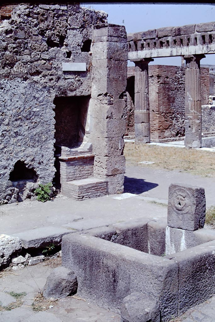 Outside VIII.2.11 Pompeii. 1968. 
Street altar at corner of Via delle Scuole. Photo by Stanley A. Jashemski.
Source: The Wilhelmina and Stanley A. Jashemski archive in the University of Maryland Library, Special Collections (See collection page) and made available under the Creative Commons Attribution-Non-Commercial License v.4. See Licence and use details.
J68f1188
