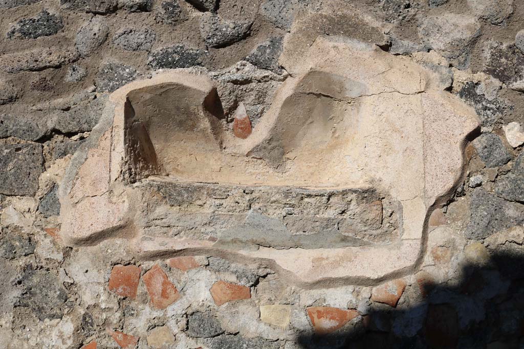 Street shrine at IX.2.12, with detail of remains of niche on north wall. December 2018. Photo courtesy of Aude Durand.