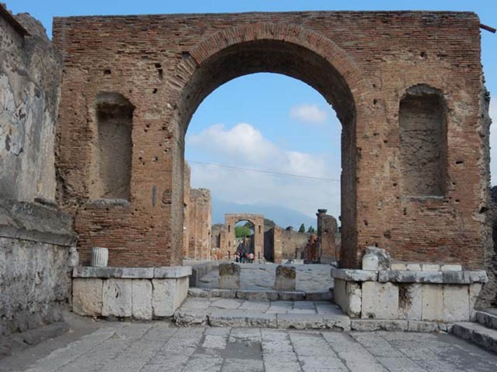 Arch at north-east end of the Forum. May 2015. South side. Photo courtesy of Buzz Ferebee.