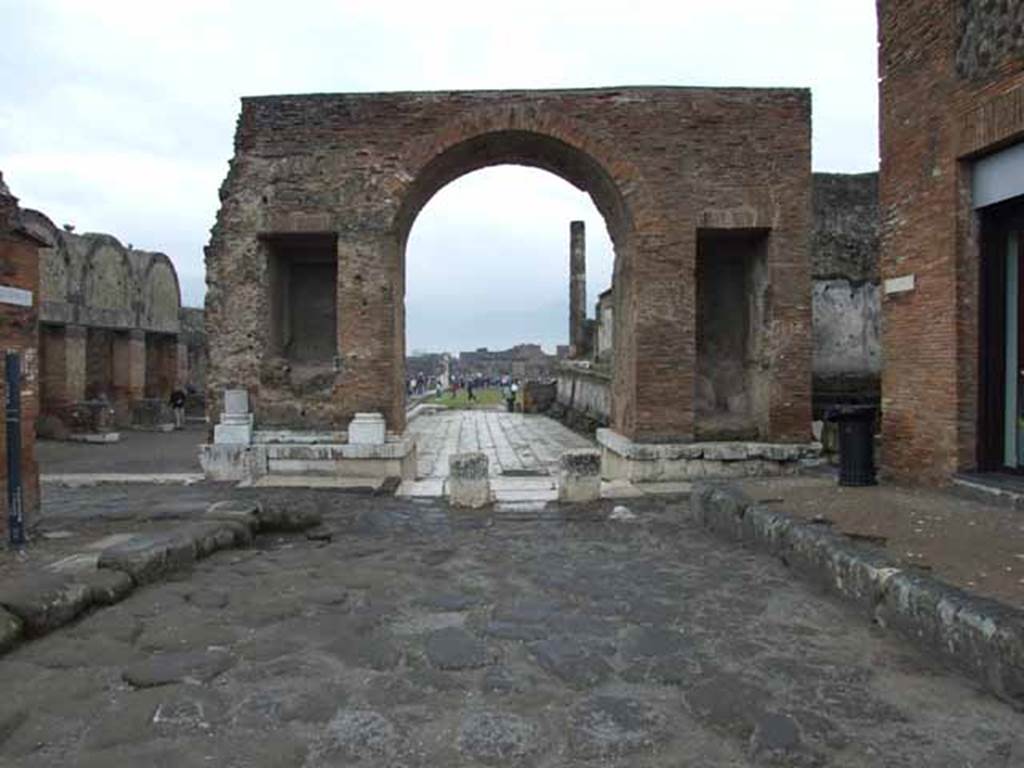 Arch at North East End of the Forum. May 2010. North side, looking south. This arch would have been faced with marble. It had two fountains on this side, and two niches for statues on the south side. An equestrian statue would have stood on the top.