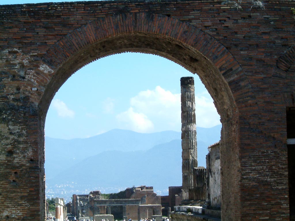 Arch at north-east end of the Forum. May 2002. 
Looking south-west through arch from Via del Foro. Photo courtesy of David Hingston.
