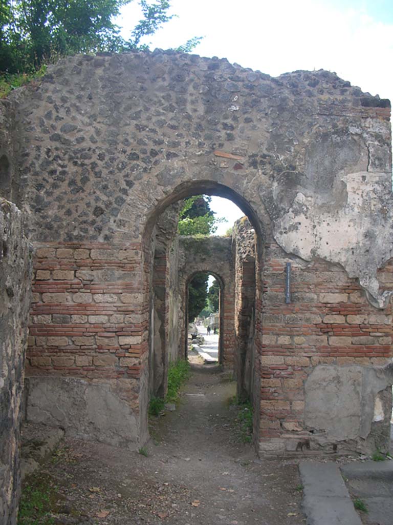 Porta Ercolano or Herculaneum Gate, Pompeii. May 2010. 
Looking north through west side of gate from Via Consolare. Photo courtesy of Ivo van der Graaff.
