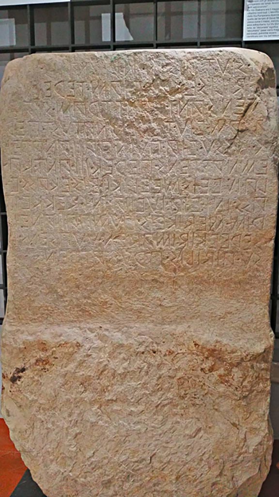 Stabian Gate, Pompeii. 
Original limestone cippus written in Oscan alphabet, found situated in the hallway of the Porta Stabiana.
Now in Naples Archaeological Museum, inv. 114466. Photo courtesy of Giuseppe Ciaramella, June 2017.

