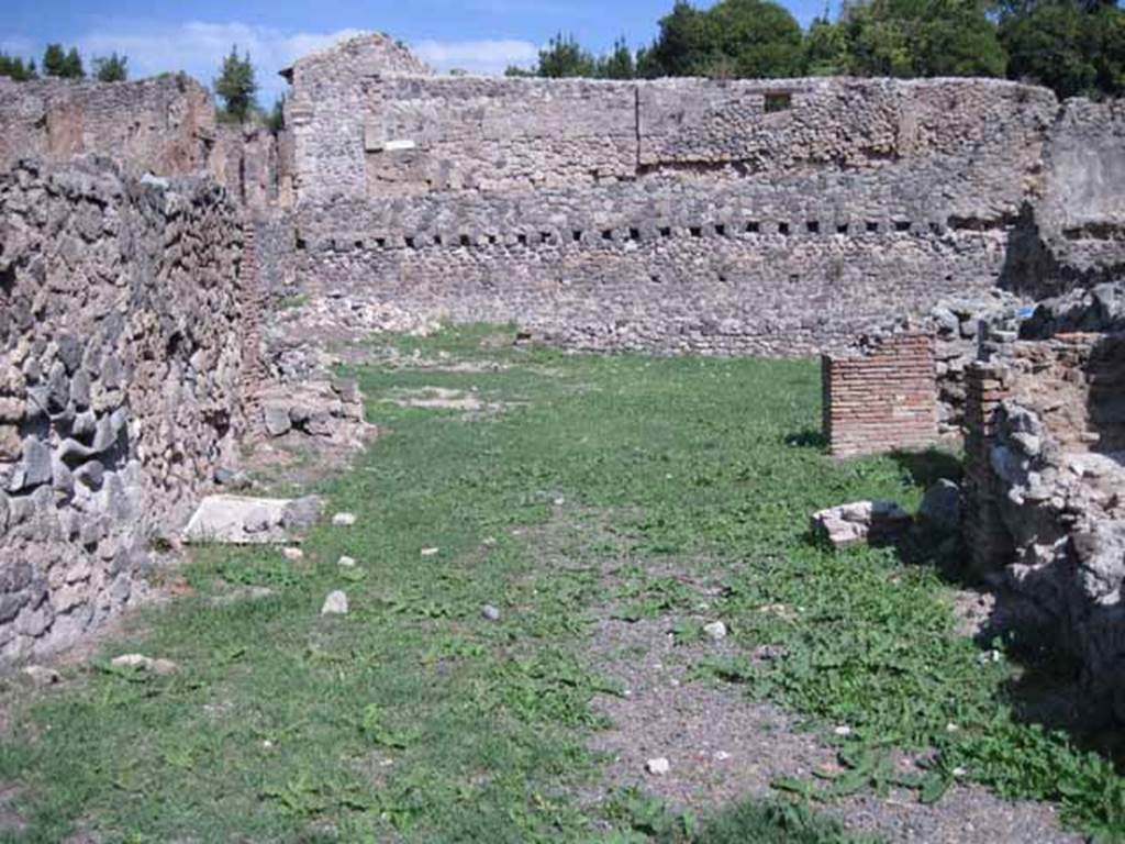 I.1.8 Pompeii. October 2024. Looking east across large entrance room. Photo courtesy of Klaus Heese.