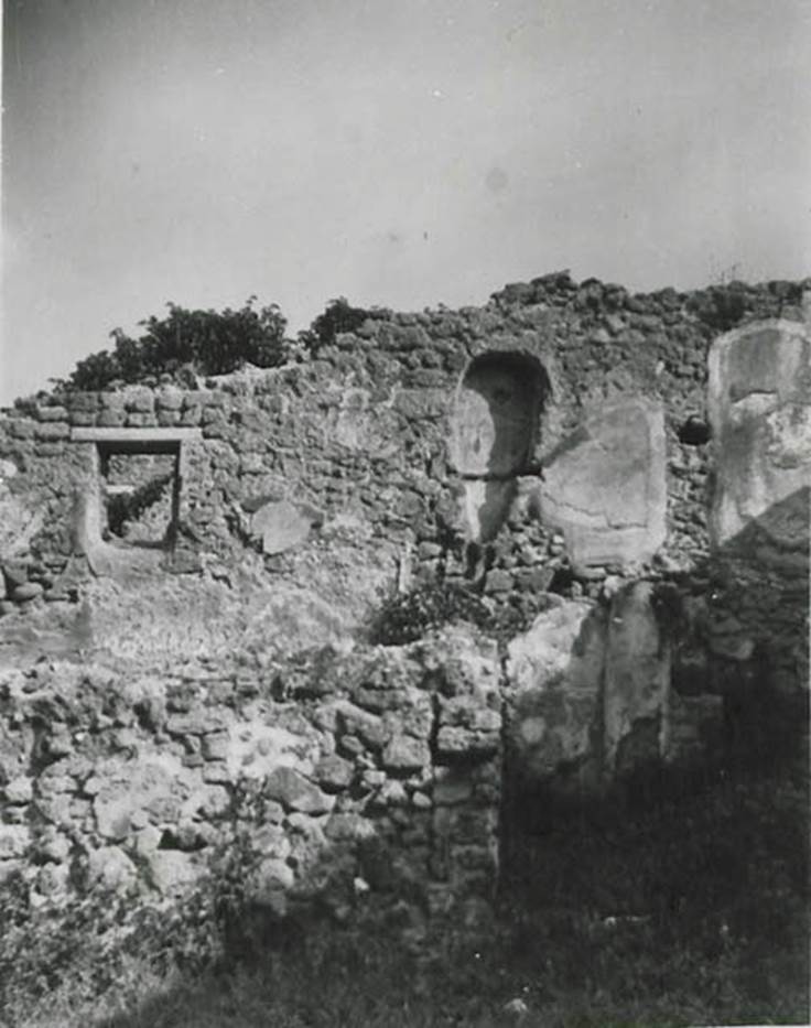 I.1.8 Pompeii. September 2010. Doorway to room on north side of yard, possibly a dormitory. The remains of the steps to upper floor are on the left of the photo. Photo courtesy of Drew Baker.
