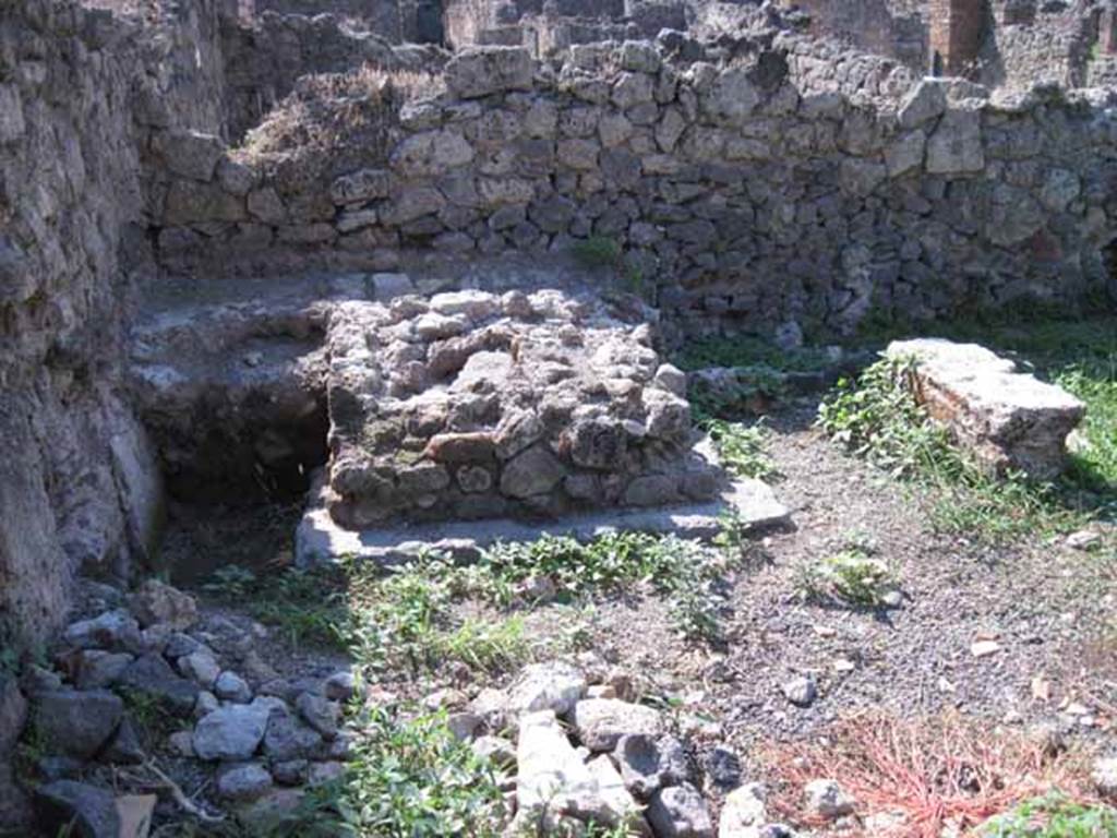 I.1.8 Pompeii. September 2010. North wall and north-west corner of yard. Photo courtesy of Drew Baker. Originally this would have been the site of other rooms.  These were bombed in 1943, destroying the internal walls and part of the north perimeter wall.  See Garcia y Garcia, L., 2006. Danni di guerra a Pompei. Rome: L’Erma di Bretschneider. (p.37)
