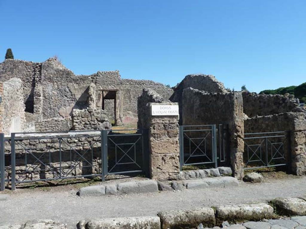 I.2.10 Pompeii, centre right.  September 2015. Looking east to entrance doorways on Via Stabiana. I.2.11 is on the left, then I.2.10 linked with I.2.9, on the right.
