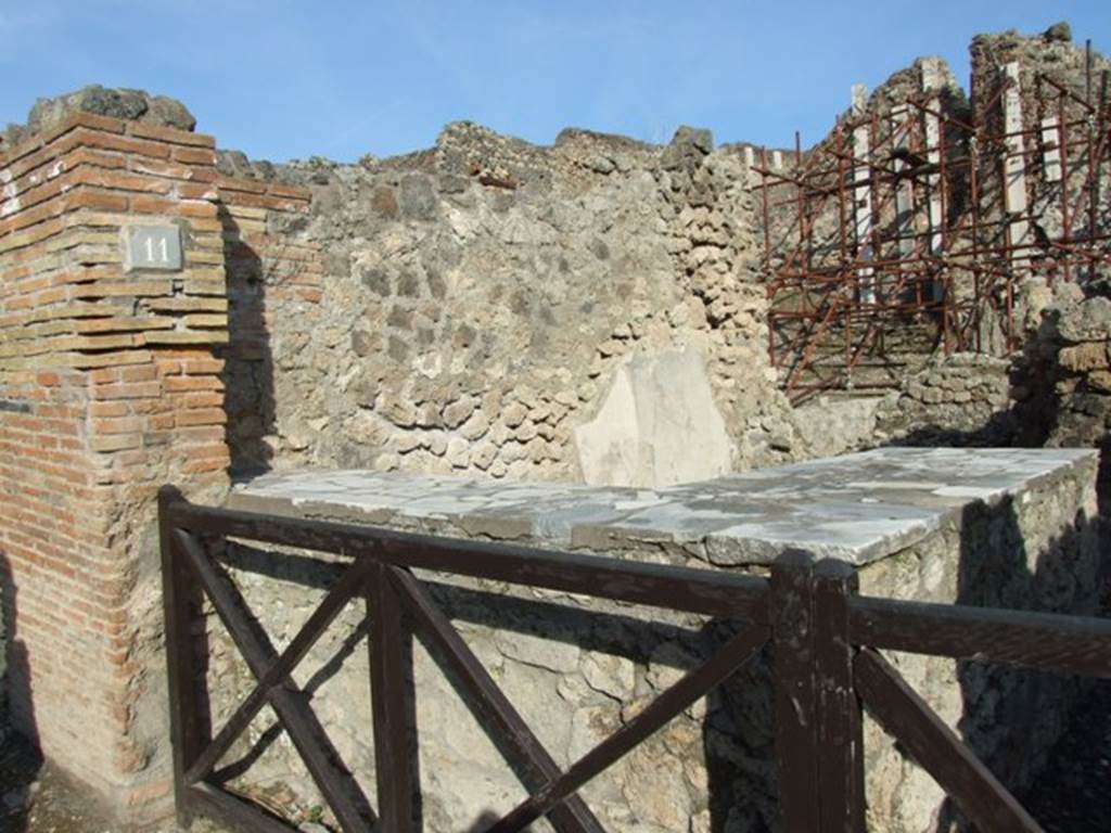 I.2.11 Pompeii.  December 2007. Entrance, and north wall of bar.