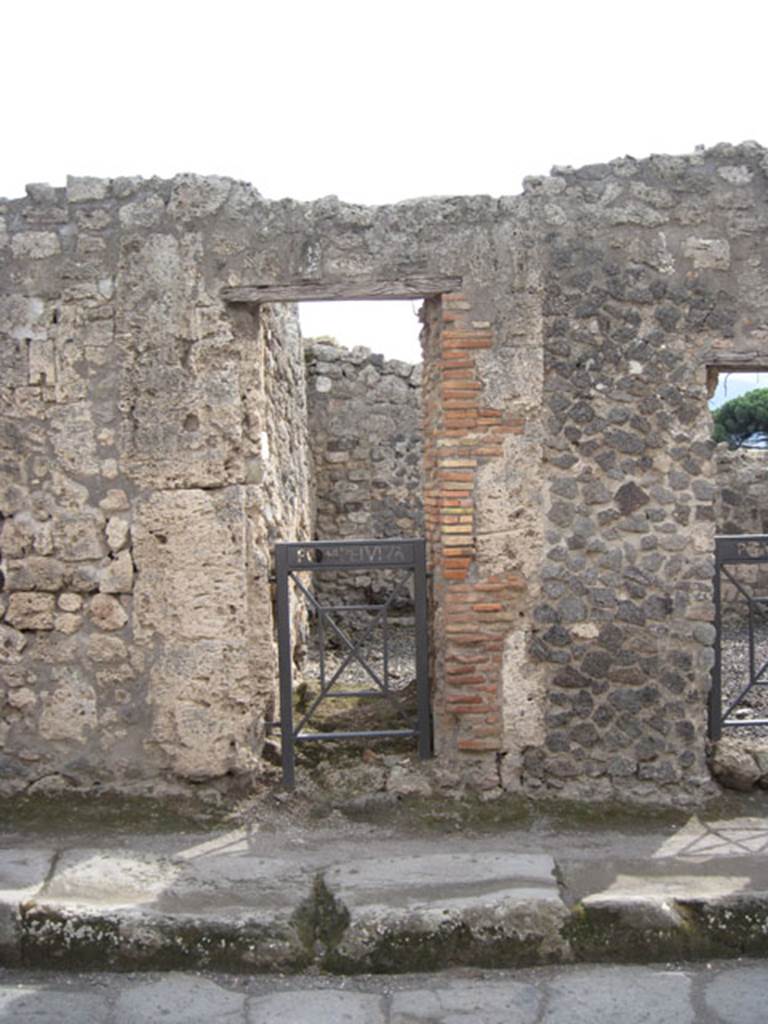 I.3.19 Pompeii. September 2010. Looking south across Vicolo del Menandro towards entrance doorway. Photo courtesy of Drew Baker.