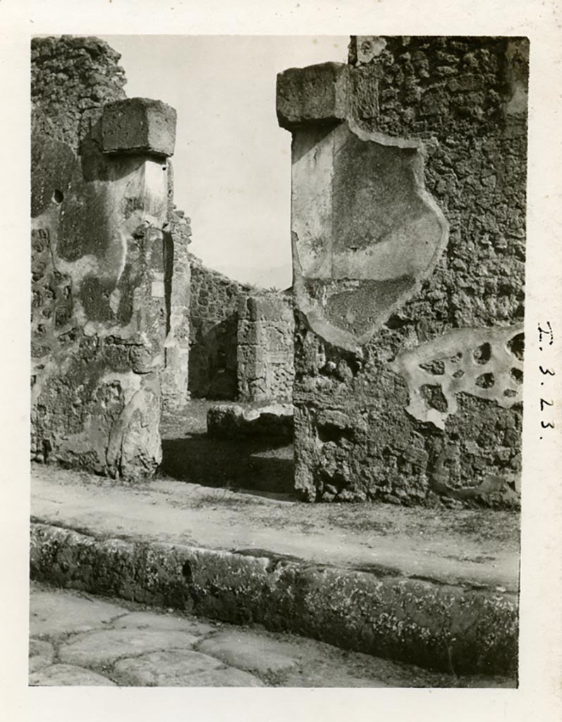 I.3.23 Pompeii. 1935 photograph taken by Tatiana Warscher.
Looking towards entrance doorway, and rooms on the east side of the atrium. 
See Warscher, T, 1935: Codex Topographicus Pompejanus, Regio I, 3: (no.39), Rome, DAIR.  
Photo courtesy of American Academy in Rome, Photographic Archive. Warsher collection no. 003.
