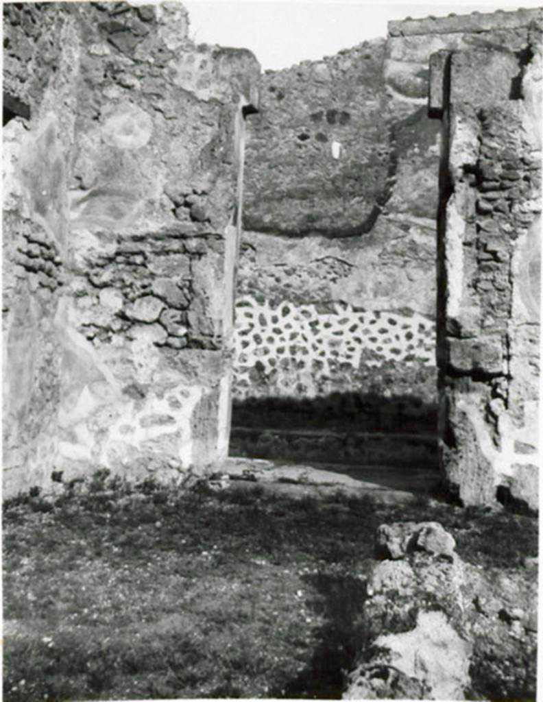 I.3.23 Pompeii. 1935 photograph taken by Tatiana Warscher. Looking north towards interior of entrance doorway, taken from the atrium. 
See Warscher, T, 1935: Codex Topographicus Pompejanus, Regio I, 3: (no.40), Rome, DAIR, whose copyright it remains.  
