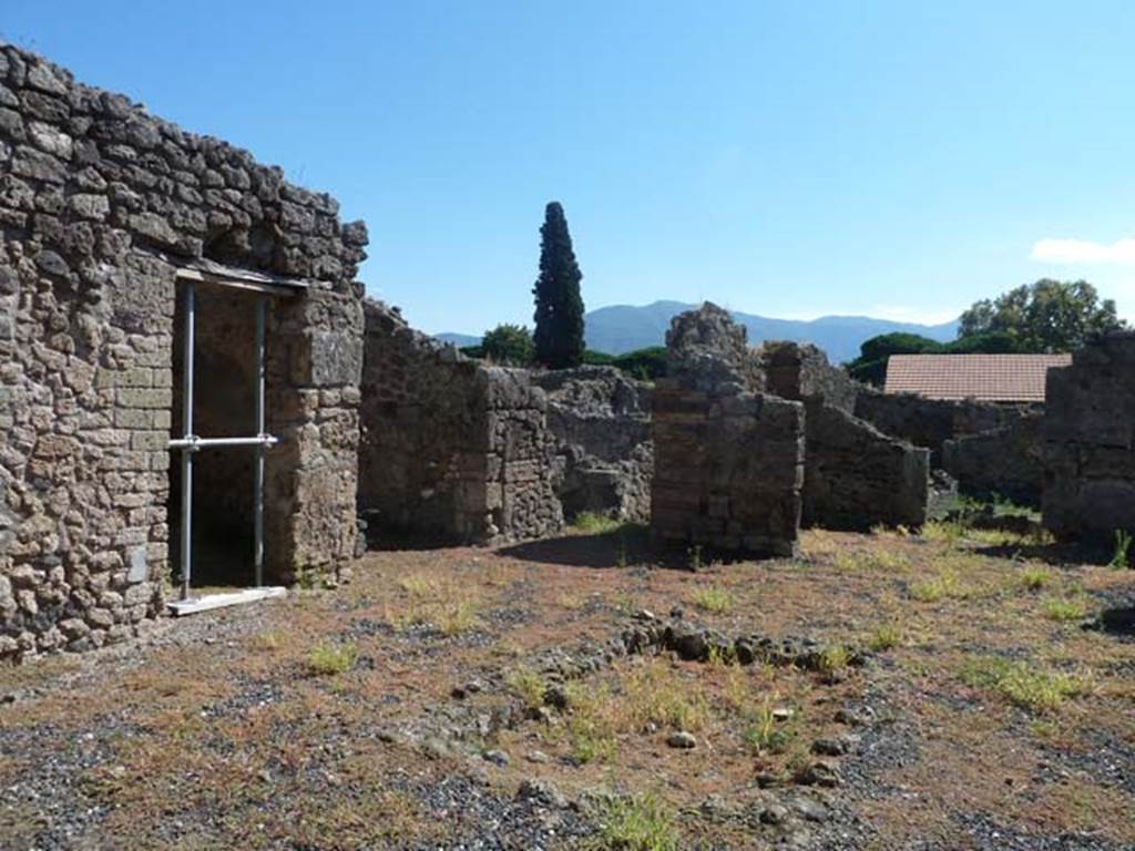 I.3.23 Pompeii. September 2015. Looking towards south-east corner of atrium, from entrance doorway.