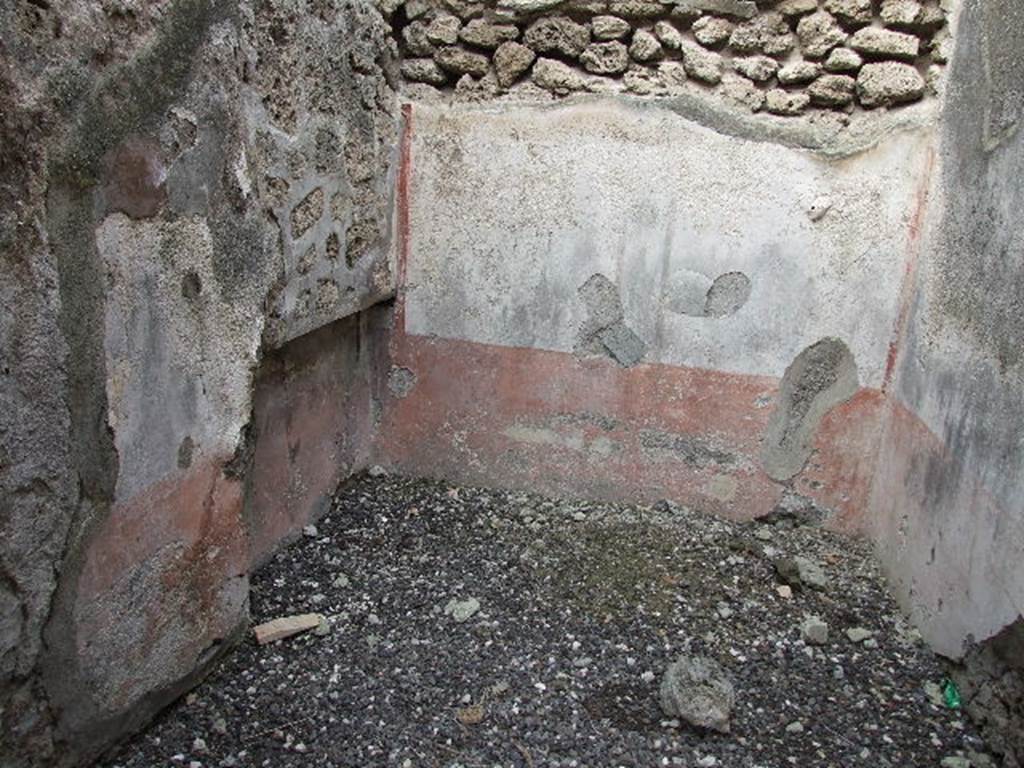 I.3.24 Pompeii. December 2006. Looking towards north wall of bedroom to west of entrance corridor. In the west wall, on the left, the recess for the bed can be seen. 
