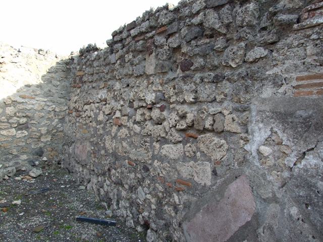 I.4.7 Pompeii. December 2018. East wall of second room, with two doorways to easterly room. Photo courtesy of Aude Durand.

