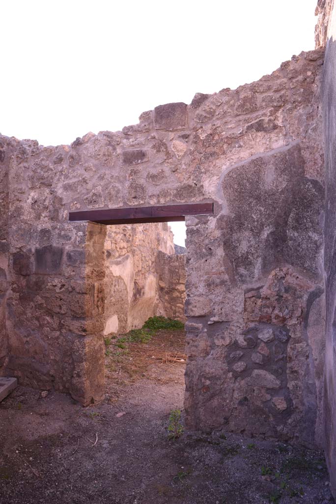 I.4.19 Pompeii. October 2019. South wall of shop-room with doorway to/from rear room.
Foto Tobias Busen, ERC Grant 681269 DCOR.
