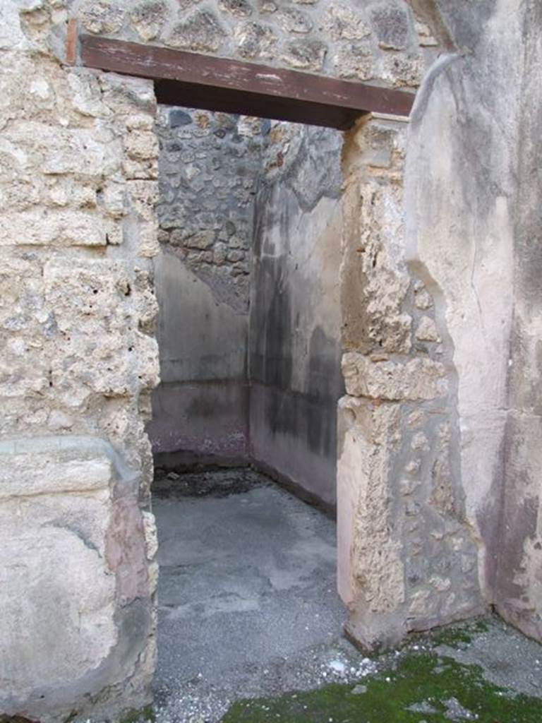 I.4.25 Pompeii. December 2007. 
Doorway to unnumbered room next to room 30 (? room 66), cubiculum. Looking south.

