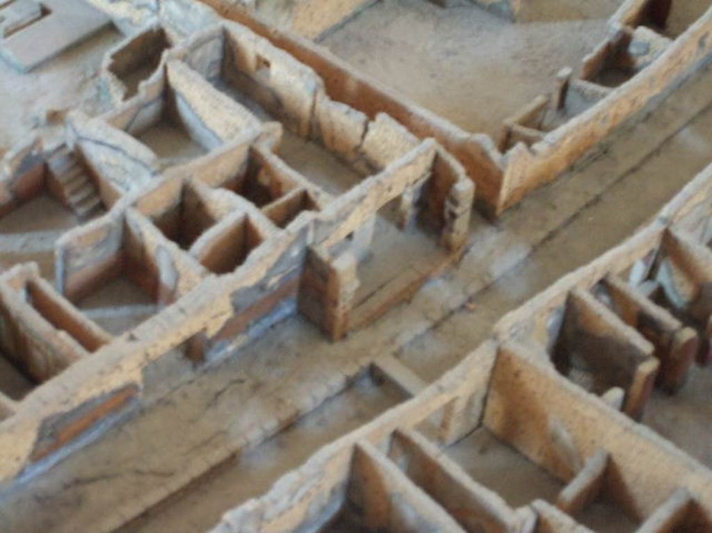 I.5.1 Pompeii, with a portico or structure outside. Model in Naples Archaeological Museum.