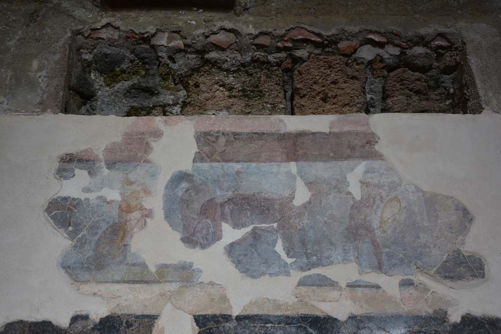 I.6.2 Pompeii. March 2019. Detail from upper centre of painted panel on north wall of north wing.
Foto Annette Haug, ERC Grant 681269 DCOR.

