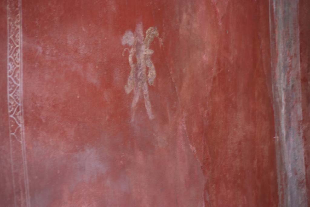I.6.7 Pompeii. September 2017. Painted flying cupid at east end of north wall. Photo courtesy of Klaus Heese.