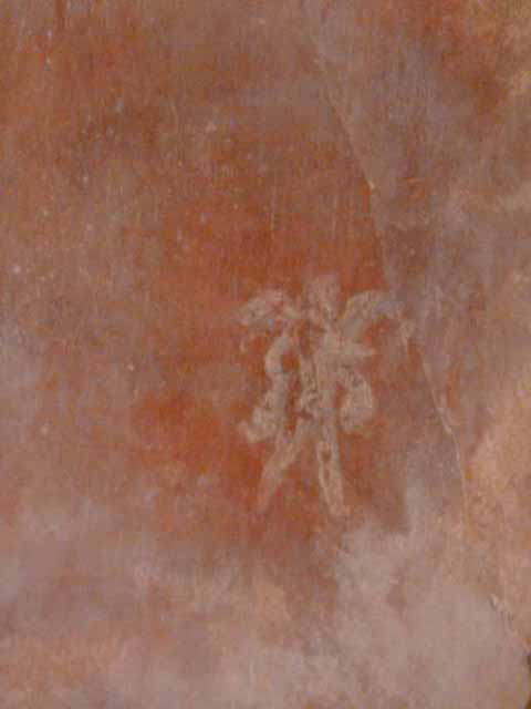 I.6.7 Pompeii. May 2010. Painted flying cupid at east end of north wall.