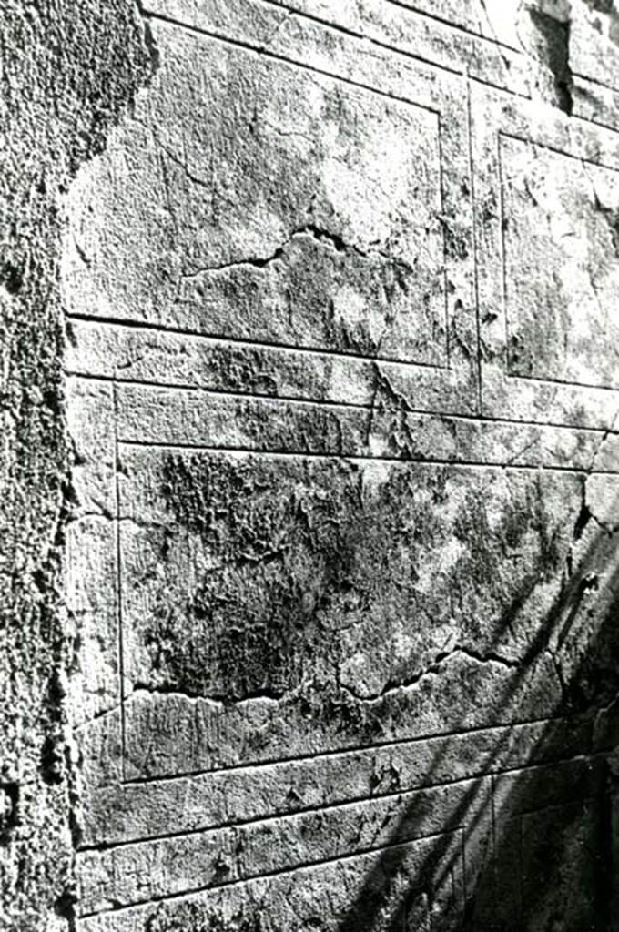 I.7.5 Pompeii. 1975. Shop, detail of E wall, next to staircase in SE corner.  Photo courtesy of Anne Laidlaw.
American Academy in Rome, Photographic Archive. Laidlaw collection _P_75_5_34. 
