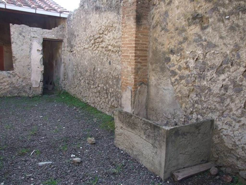 I.7.5 Pompeii. December 2007. Looking south across west side of vestibule and courtyard.
According to PPM, found in the north-west corner was the mouth of the underlying cistern for collecting rainwater which was collected by terracotta pipes.
