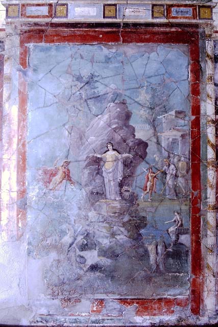 I.7.7 Pompeii. December 2006. Triclinium, detail of wall painting of floating figure.