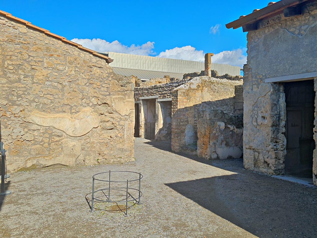 I.7.11 Pompeii. March 2024. Looking north across atrium, with remains of impluvium. Photo courtesy of Giuseppe Ciaramella.