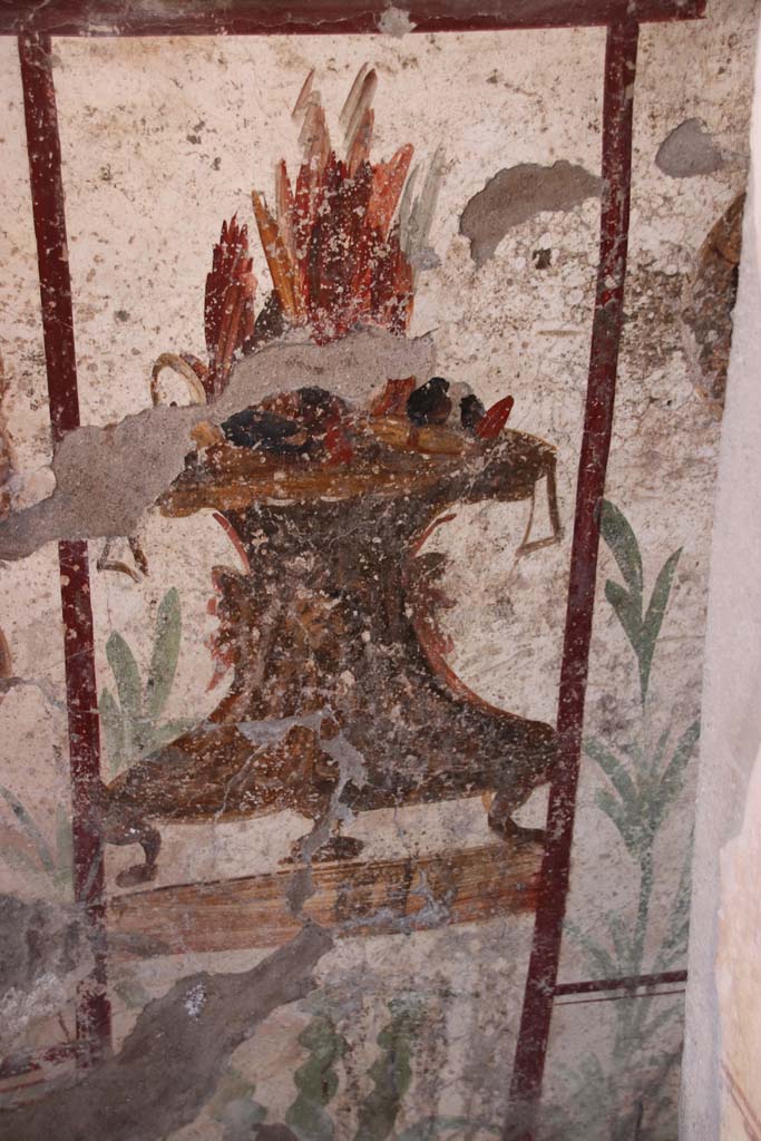 I.7.11 Pompeii. September 2021. Painted altar on west wall. Photo courtesy of Klaus Heese.