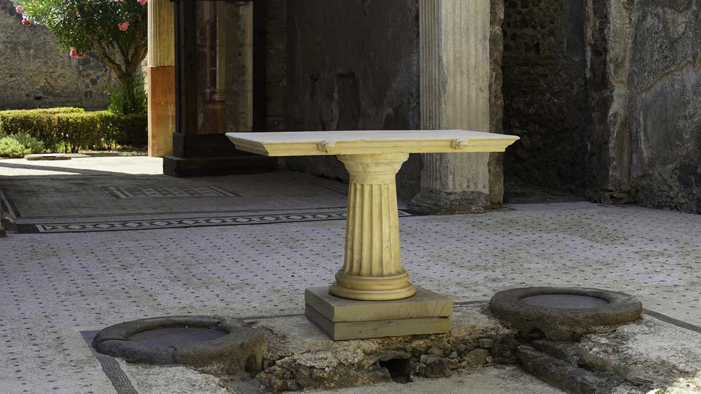 I.9.5 Pompeii. August 2021. Room 3, looking south across impluvium in atrium towards travertine table. Photo courtesy of Robert Hanson.