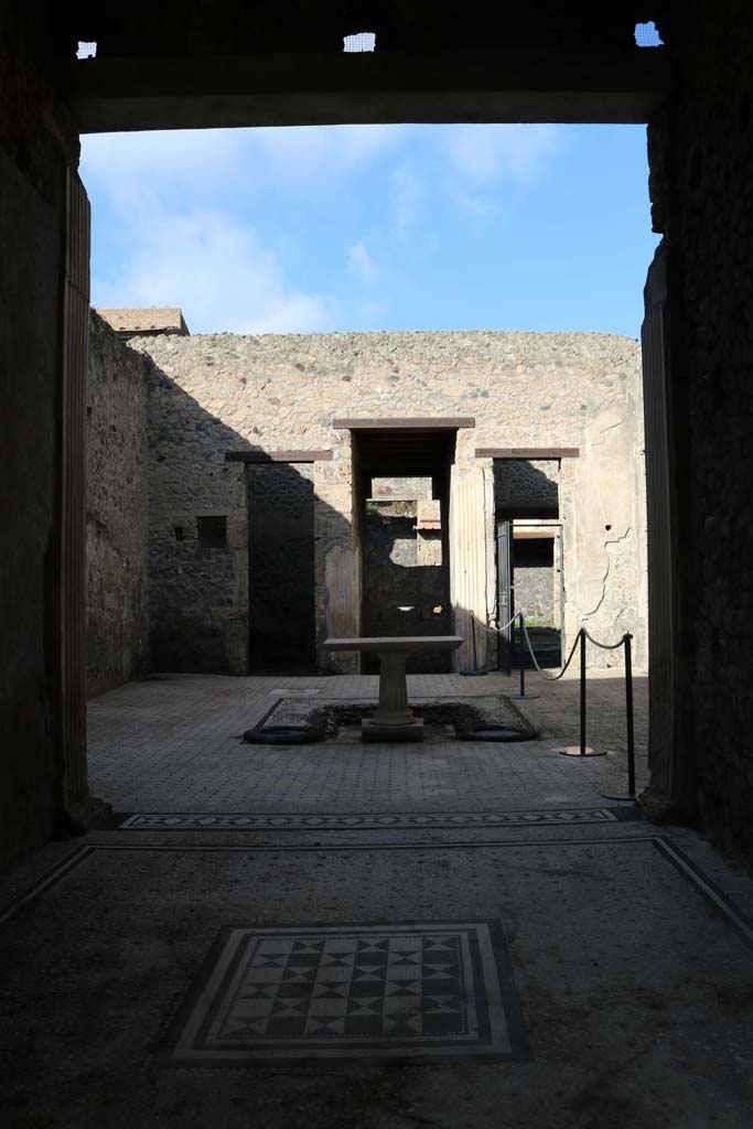 I.9.5 Pompeii. December 2018. 
Room 8, looking north from tablinum towards atrium and doorways to rooms on either side of entrance corridor.
Photo courtesy of Aude Durand.

