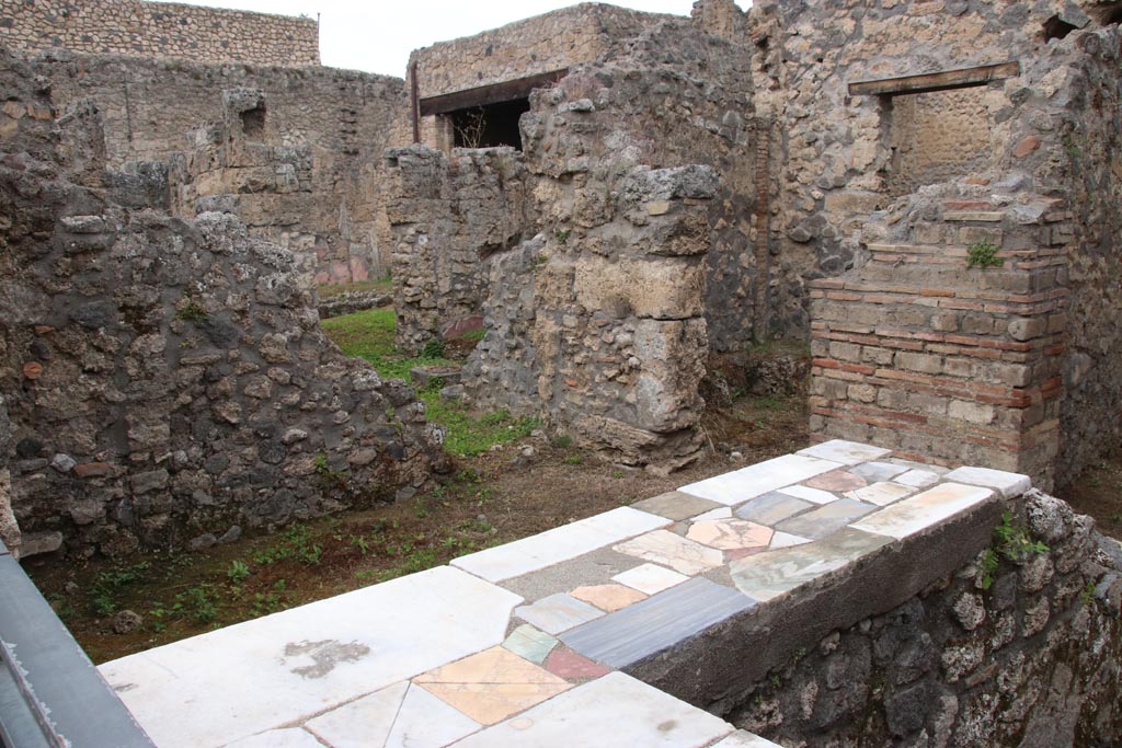 I.9.11 Pompeii. May 2024. Looking north-west from entrance doorway. Photo courtesy of Klaus Heese.