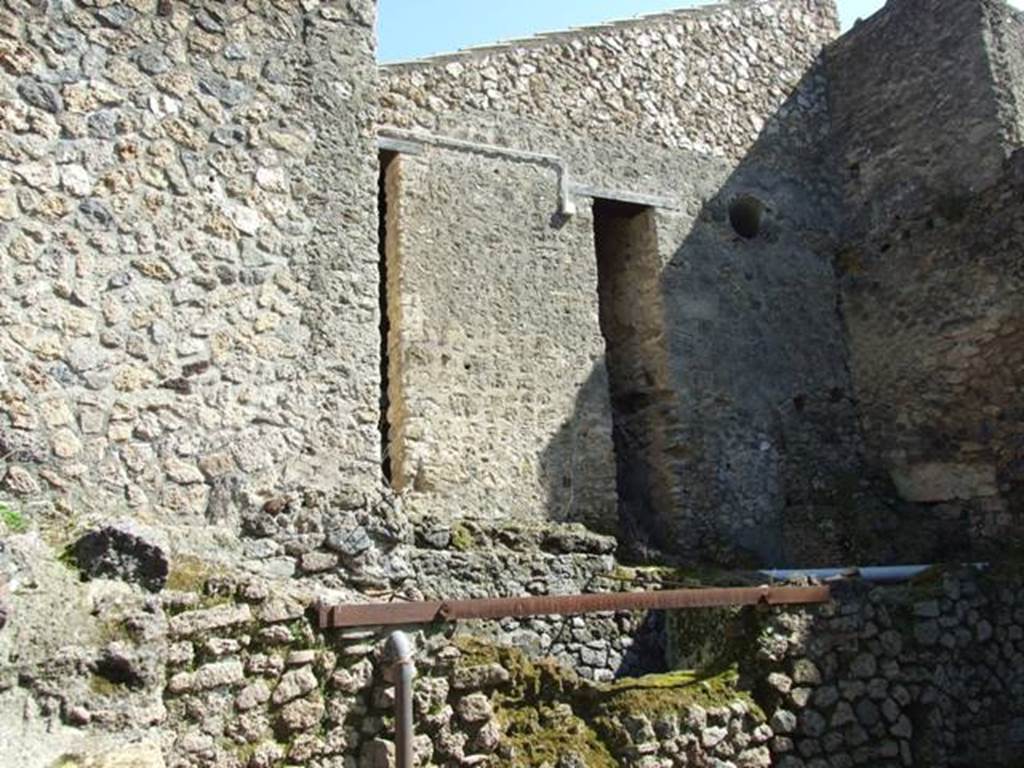 I.10.4 Pompeii. March 2009. Looking at rear upper wall of Baths area.