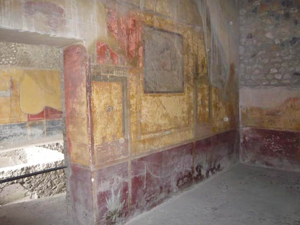 1.10.4 Pompeii. May 2012. Room 19, north wall with doorway to room 18. Photo courtesy of Buzz Ferebee.
