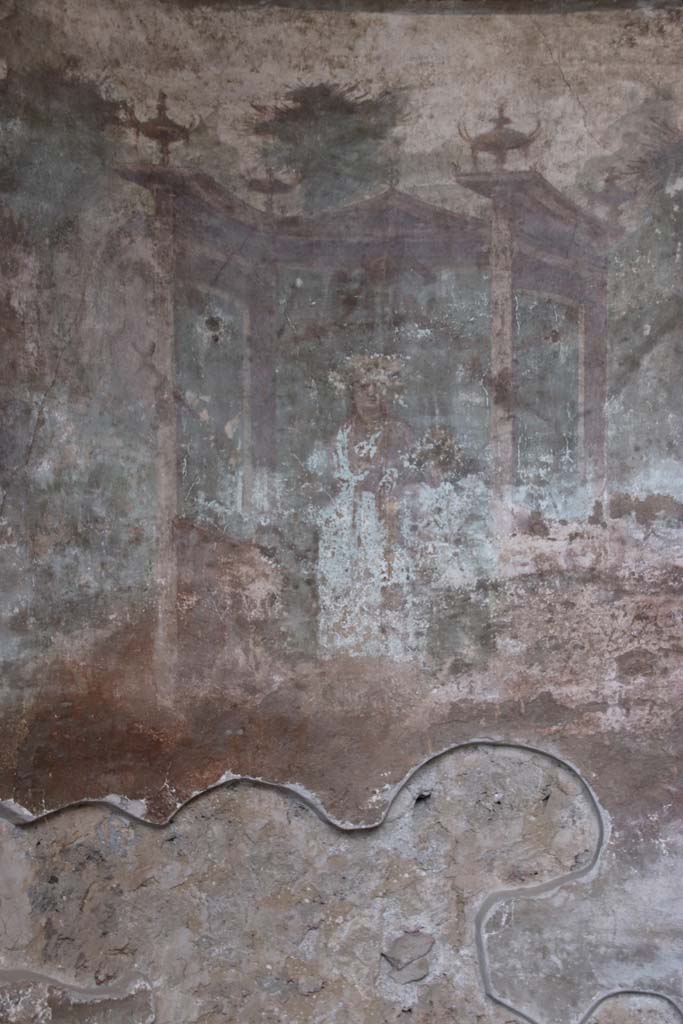 I.10.4 Pompeii. September 2021. 
Alcove 24, detail of painted Venus and cherubs in temple. Photo courtesy of Klaus Heese.
