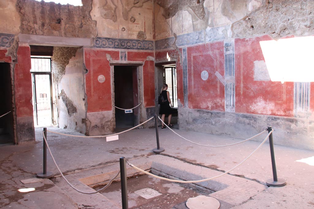 I.10.11 Pompeii. October 2022. Room 2, looking north-west across impluvium in atrium. Photo courtesy of Klaus Heese. 