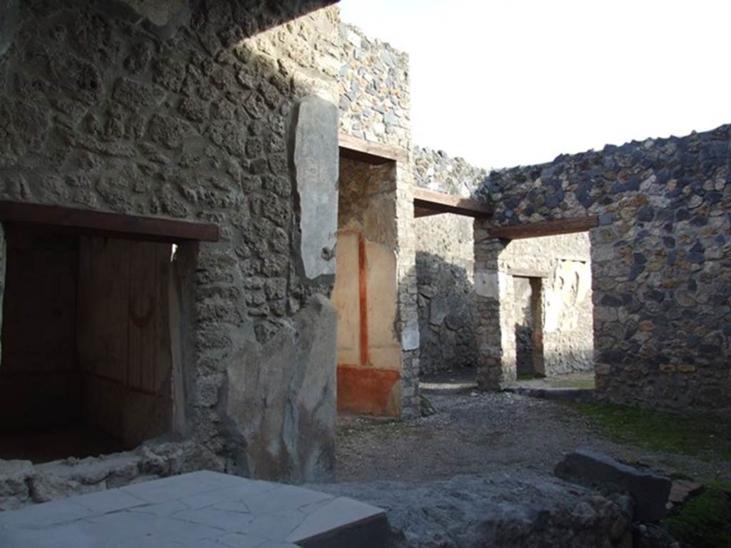 I.11.1 Pompeii.  Caupona.  Looking towards the east wall.  Window of Cubiculum, entrance of ala and corridor to rear.