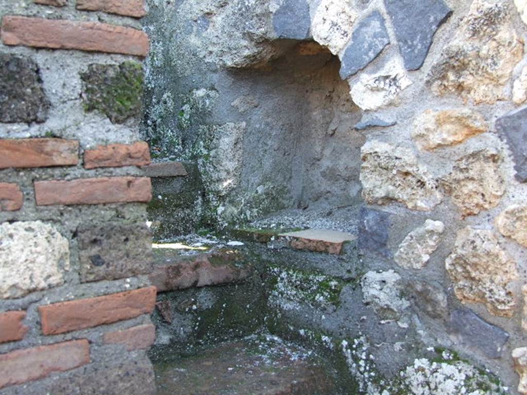 I.11.14 Pompeii. December 2006. Niche in south wall by staircase.
