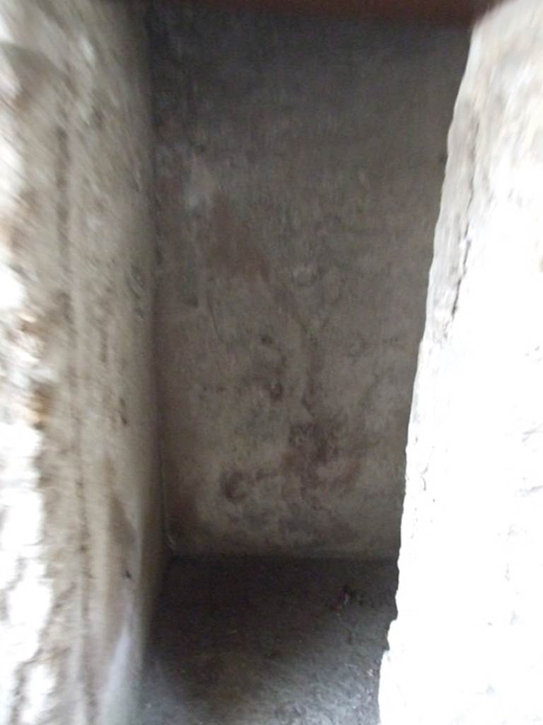 I.11.16 Pompeii. December 2007.  Room 13, small storeroom, cella penaria, on east side of corridor room 9. According to Packer, the original ceiling was 2.30m above the floor level.

