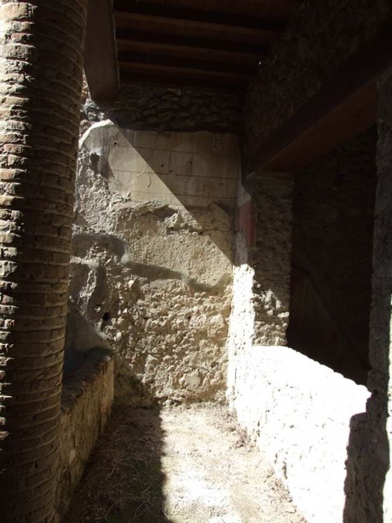 I.12.3 Pompeii. March 2009. Looking west along passageway on north side of garden, with window from triclinium.