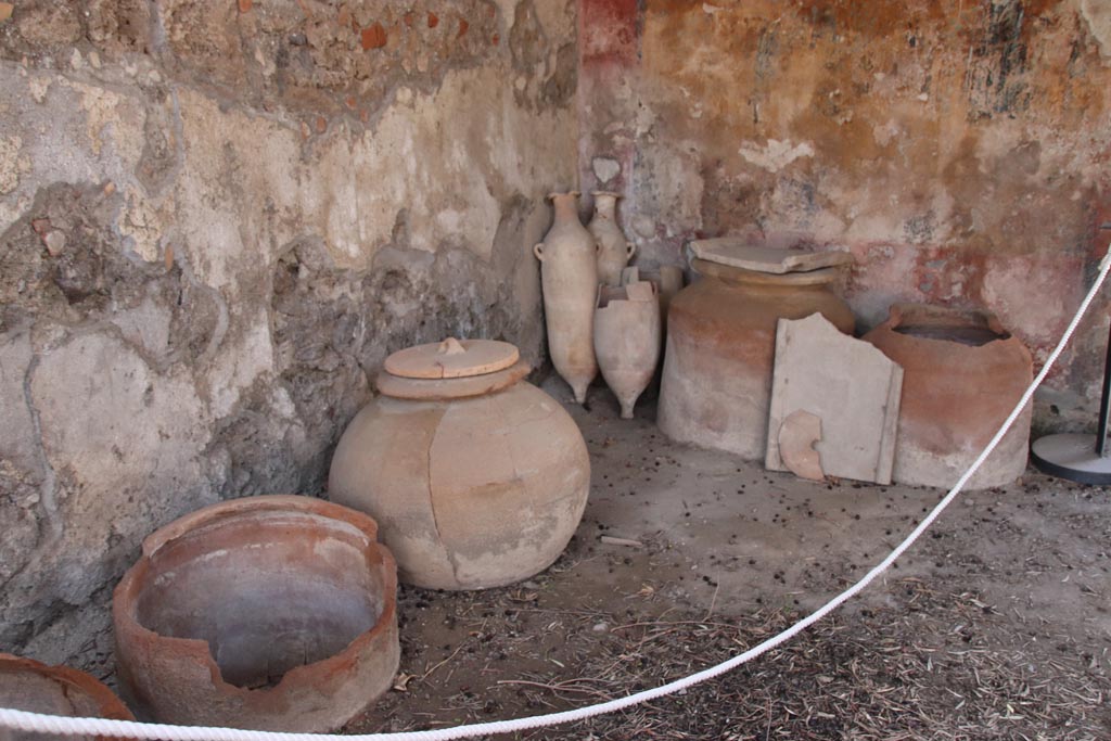 I.12.8 Pompeii. October 2022. Terracotta in north-west corner of peristyle 9. Photo courtesy of Klaus Heese.