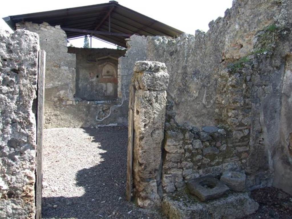 I.12.15 Pompeii. March 2009. Doorway to room 3, looking east into windowed triclinium.