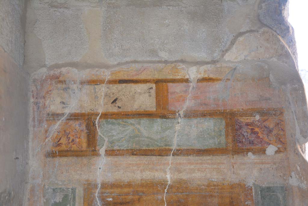 I.13.2 Pompeii. October 2019. Detail from upper west wall in south-west corner of second room on east side of atrium.
Foto Annette Haug, ERC Grant 681269 DÉCOR.
