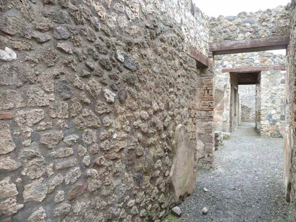 I.13.4 Pompeii. May 2010. Looking south along east wall of entrance corridor. 