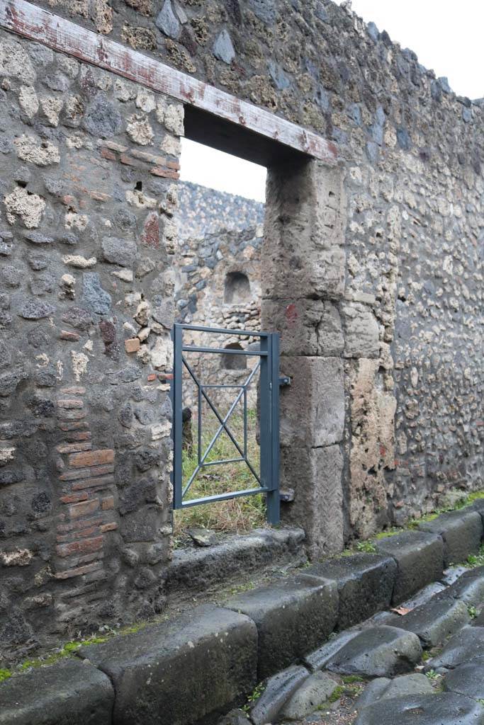 I.13.6 Pompeii. December 2018. 
Entrance doorway on west side of Via di Nocera. Photo courtesy of Aude Durand.
