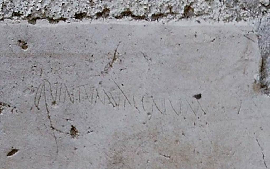 I.13.9 Pompeii. 1966. Inscription from plaster further to south (left) of doorway. 
Detail from photo J66f0274 by Stanley A. Jashemski.  
According to Epigraphik-Datenbank Clauss/Slaby (See www.manfredclauss.de) this read

Quintum Valerium       [CIL IV 10072a]
See Varone A., 2012. Titulorum Graphio Exaratorum Qui In C.I.L. Vol. IV Collecti Sunt Imagines: Studi SAP 31. Roma: L’Erma di Bretschneider, p. 87.
