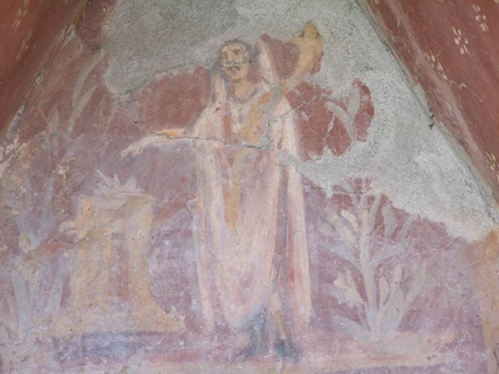 I.14.7 Pompeii. March 2009. Painting of Genius and altar amidst a painted garden.
See Frhlich, T., 1991. Lararien und Fassadenbilder in den Vesuvstdten. Mainz: von Zabern, L33, p. 262-3, Taf.  6.
