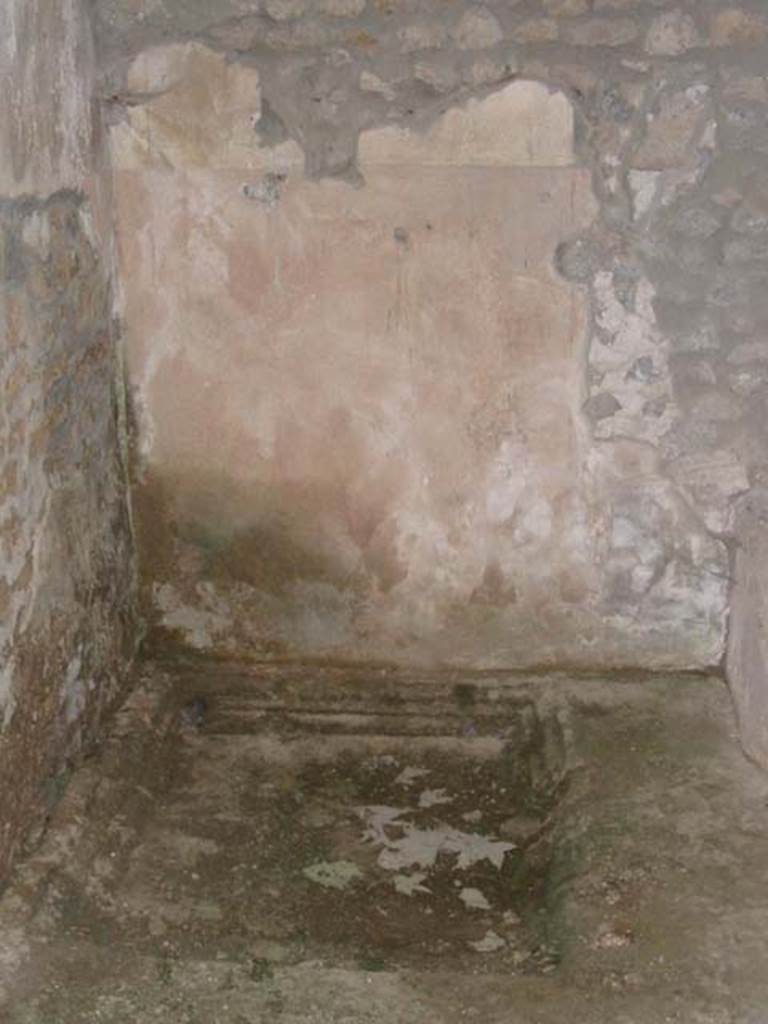I.14.15 Pompeii. May 2003. Basin in floor on east side of room on north side of bar-room.
Photo courtesy of Nicolas Monteix.
